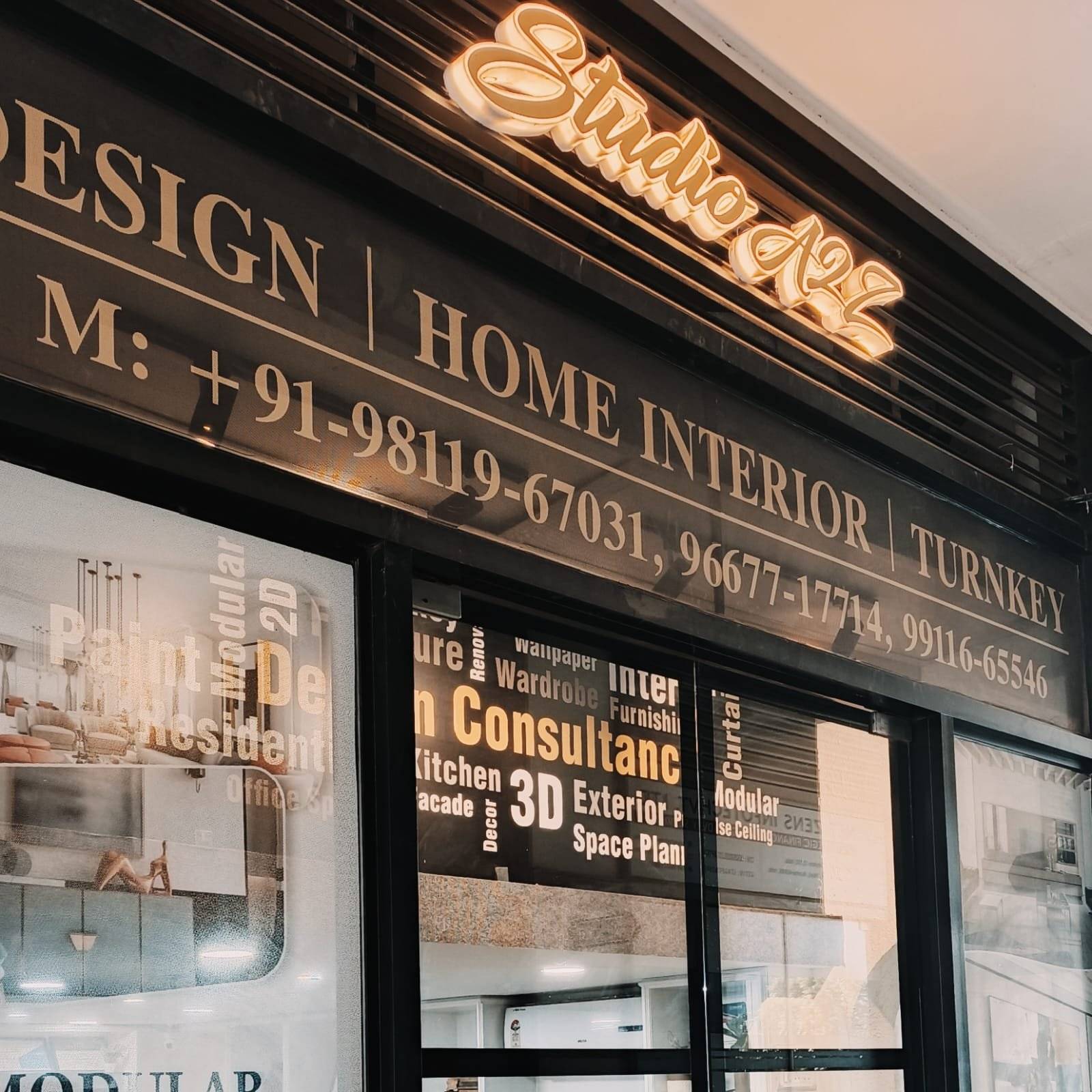 Studio A2Z advertisement showcasing luxury interior design services with a focus on smart space planning and cutting-edge VR previews. The image includes a stylish modern bedroom, a vibrant lounge area with ambient lighting, and a sophisticated hallway, emphasizing comfort and functionality